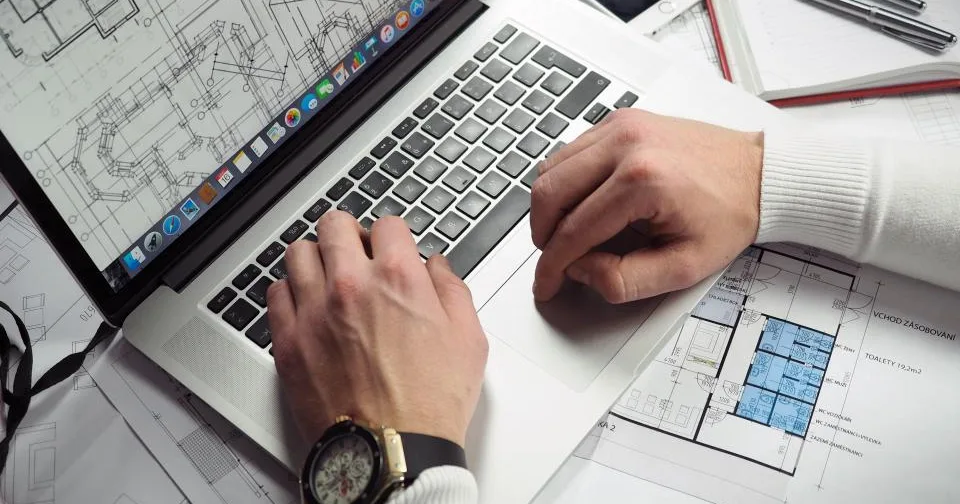 A desk set up for planning a new business
